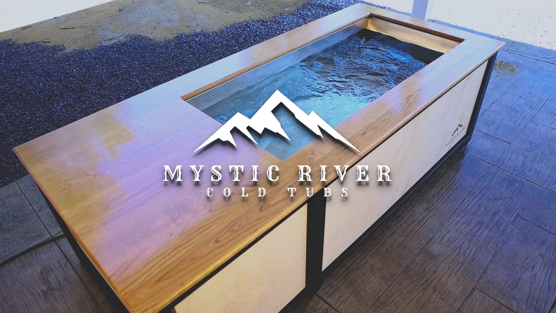 Load video: A man on a patio using a Mystic River Cold Tub